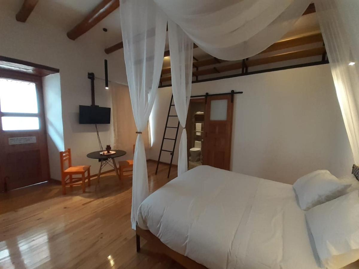 Hostal Suite Le Fabrique Cuenca Bagian luar foto