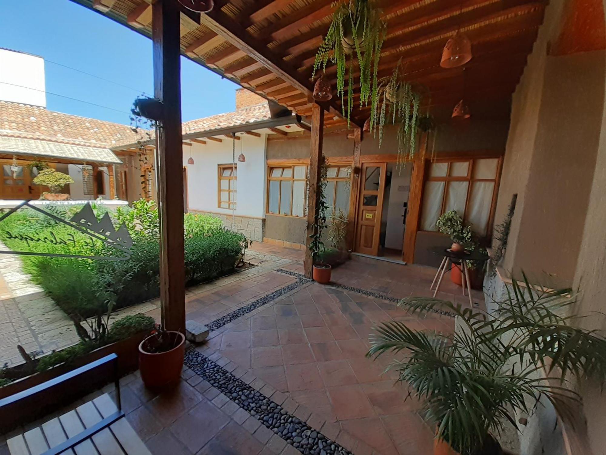 Hostal Suite Le Fabrique Cuenca Ruang foto